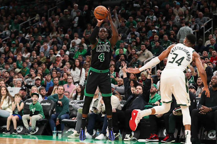 Boston Celtics guard Jrue Holiday (4) shoots during the first half against the Milwaukee Bucks